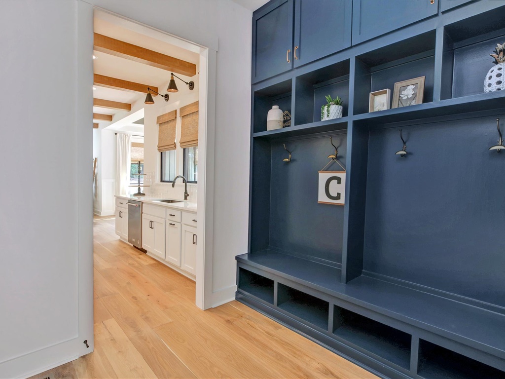 Mudroom with custom navy lockers