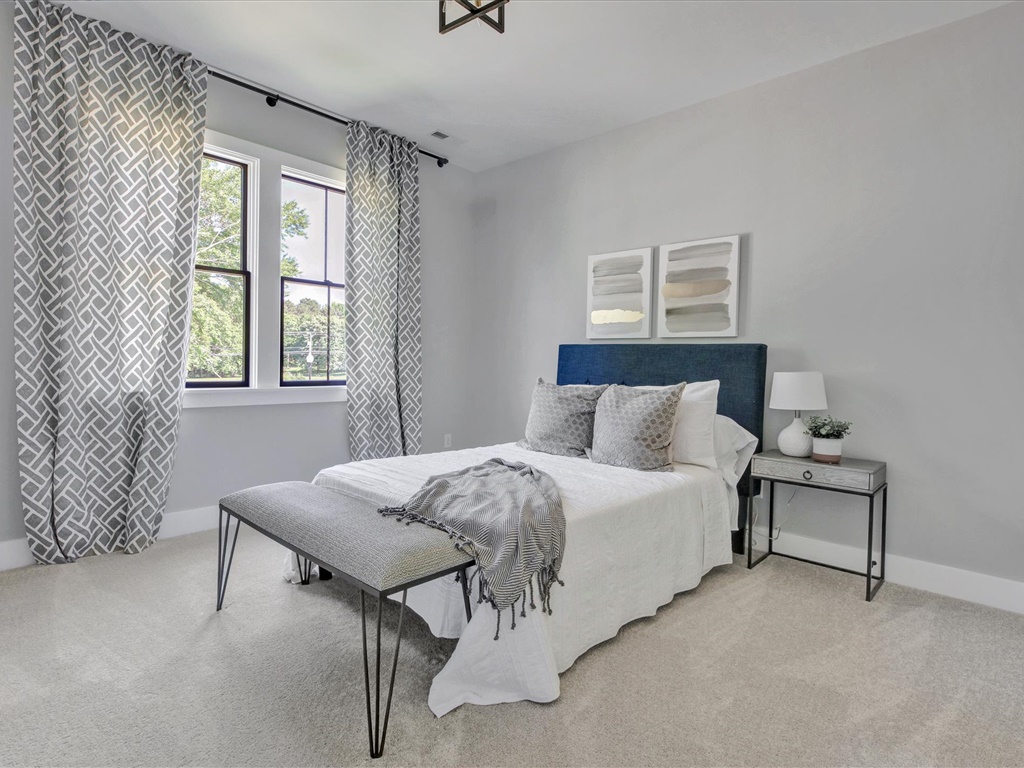 Guest bedroom with upholstered headboard